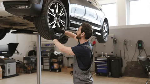 Mechanic working on engine